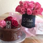 BarOne Ganache Cake and Small Hatbox of flowers combo gift set by Petals Gourmet Flowers.