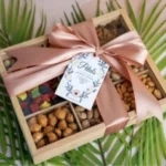 Large box of mixed fruit and nuts gift packaged by Petals Gourmet Flowers to order online for delivery to Johannesburg, Cape Town and Durban.